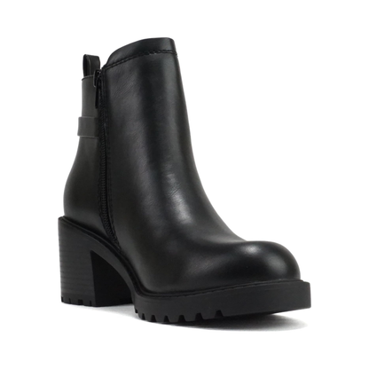 Bottines chelsea noires à talon bloc, semelle crantée et bride décorative pour femme